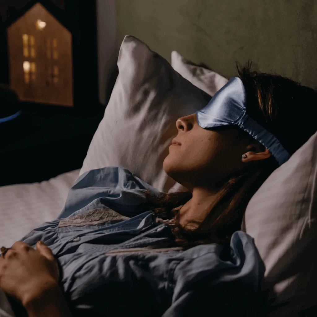 girl sleeping with sleep mask on