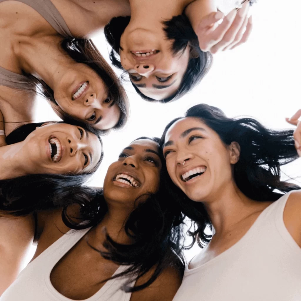 girls in a group laughing